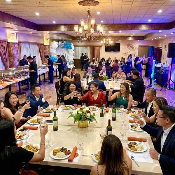 Guests at Anejo Cantina and Grill enjoying a lively event with food, drinks, and dancing.