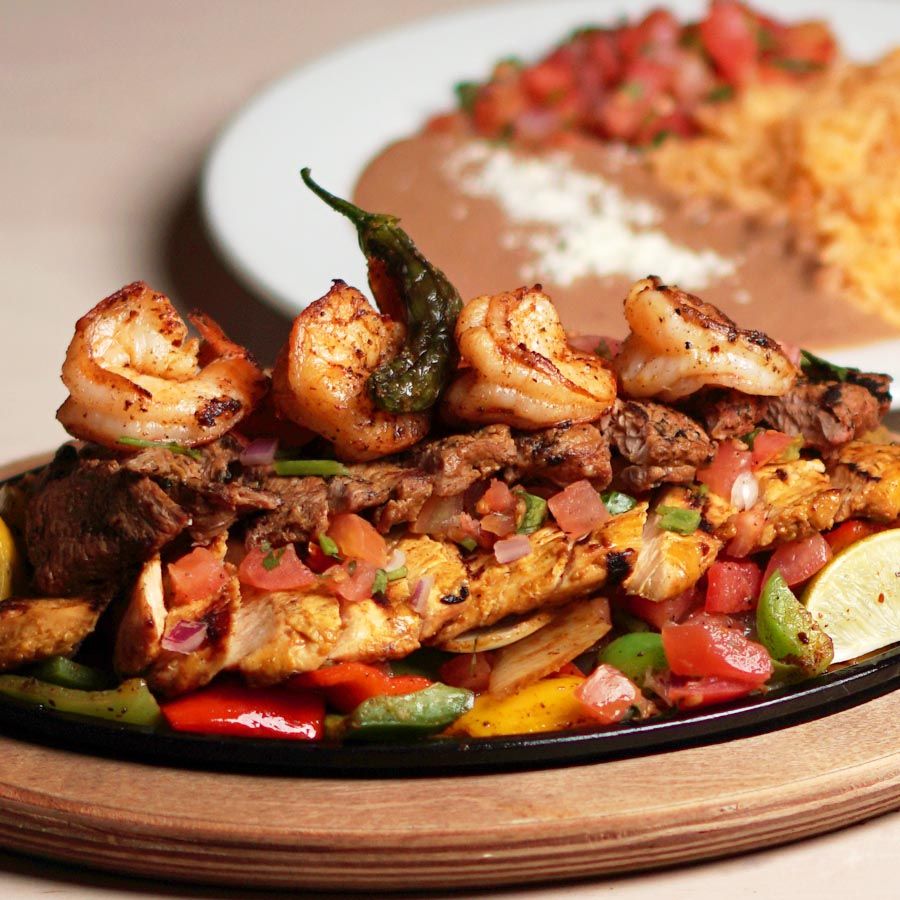 Carne asada with shrimp and re-fried beans and rice